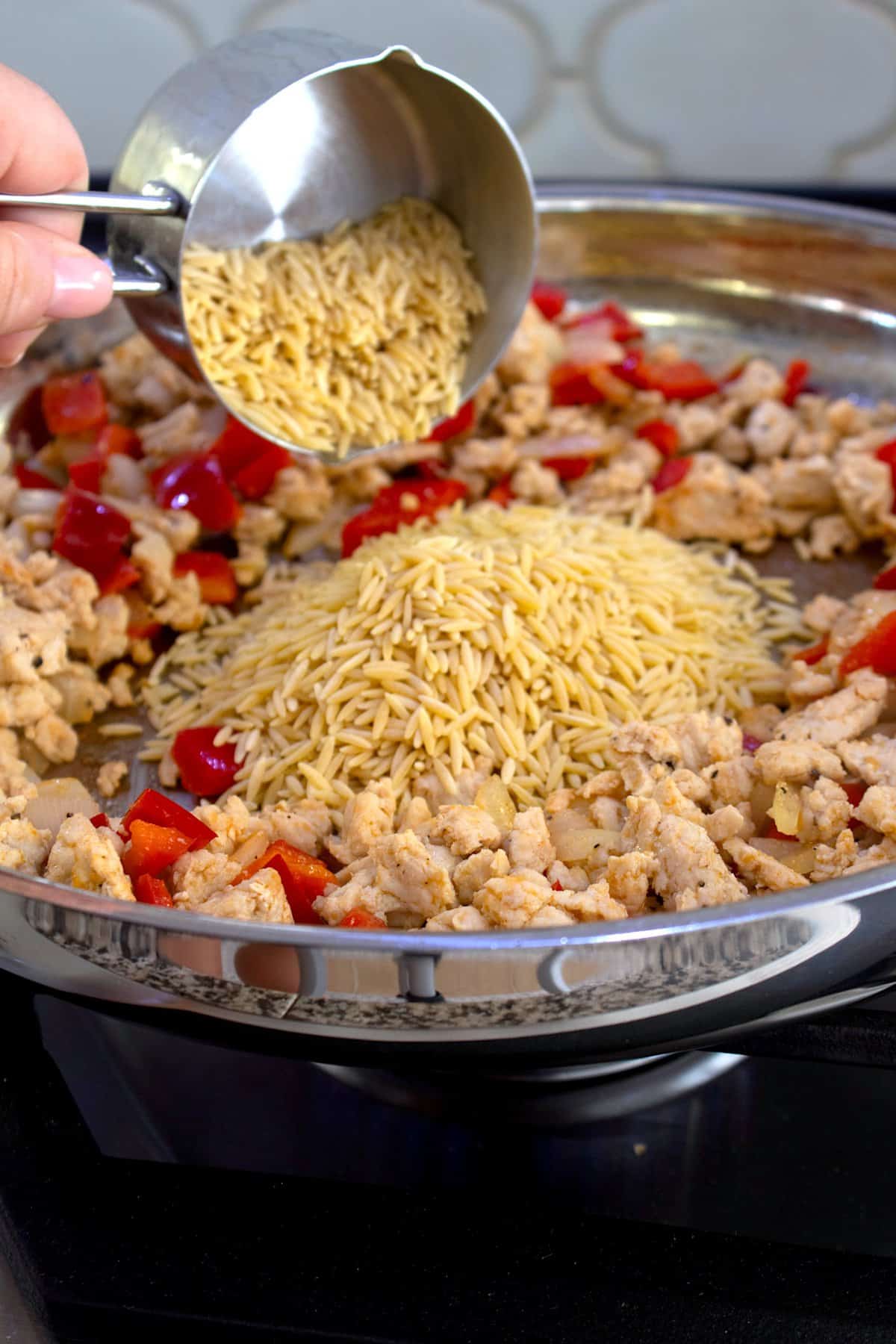 cooking ground chicken with bell pepper onion and orzo