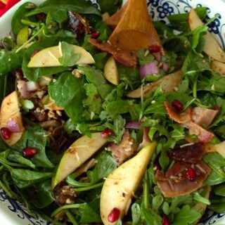 overhead view of winter salad in a white bowl