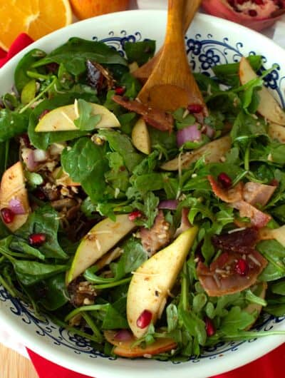 overhead view of winter salad in a white bowl