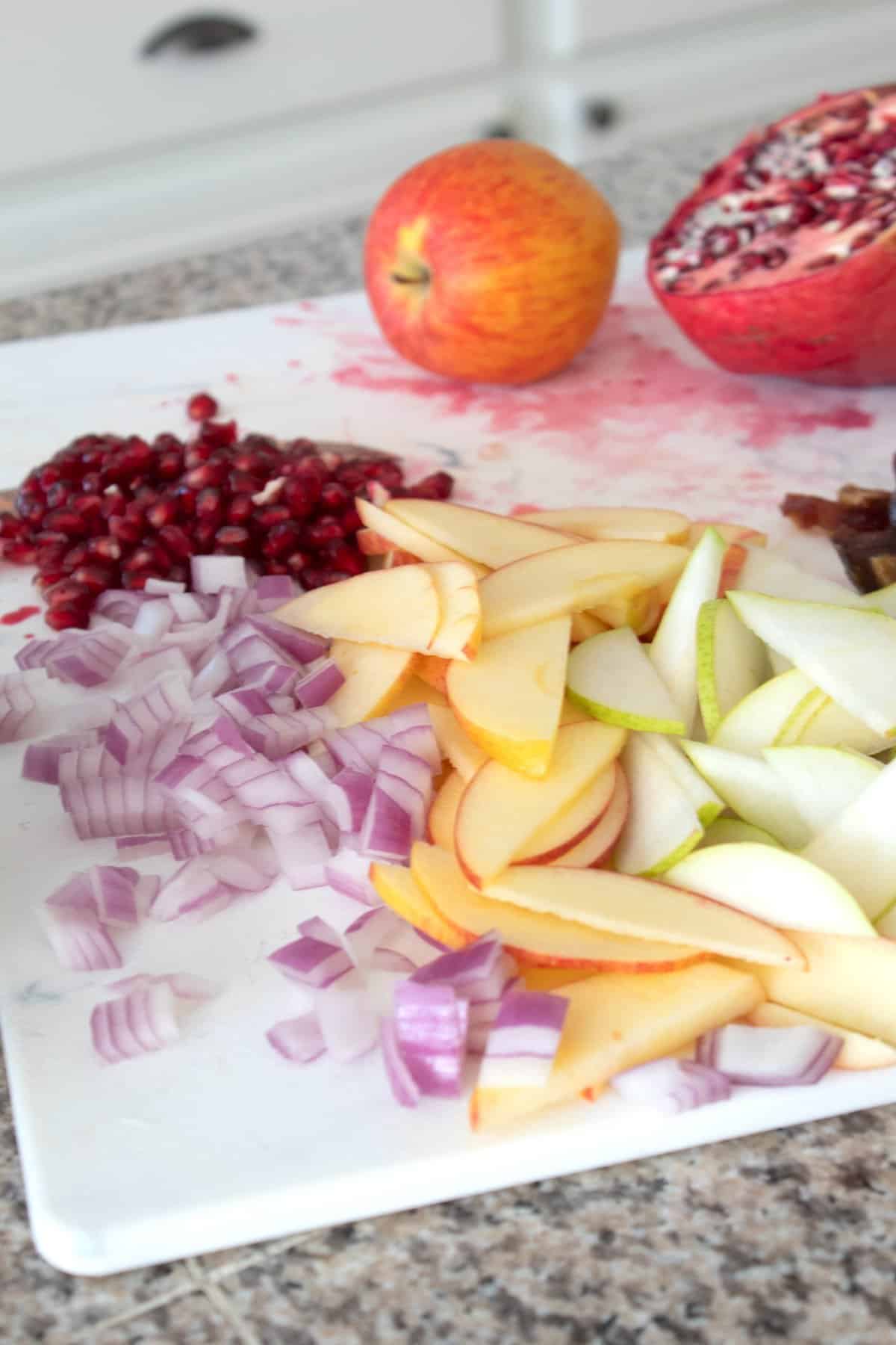 winter salad ingredients on a cutting board