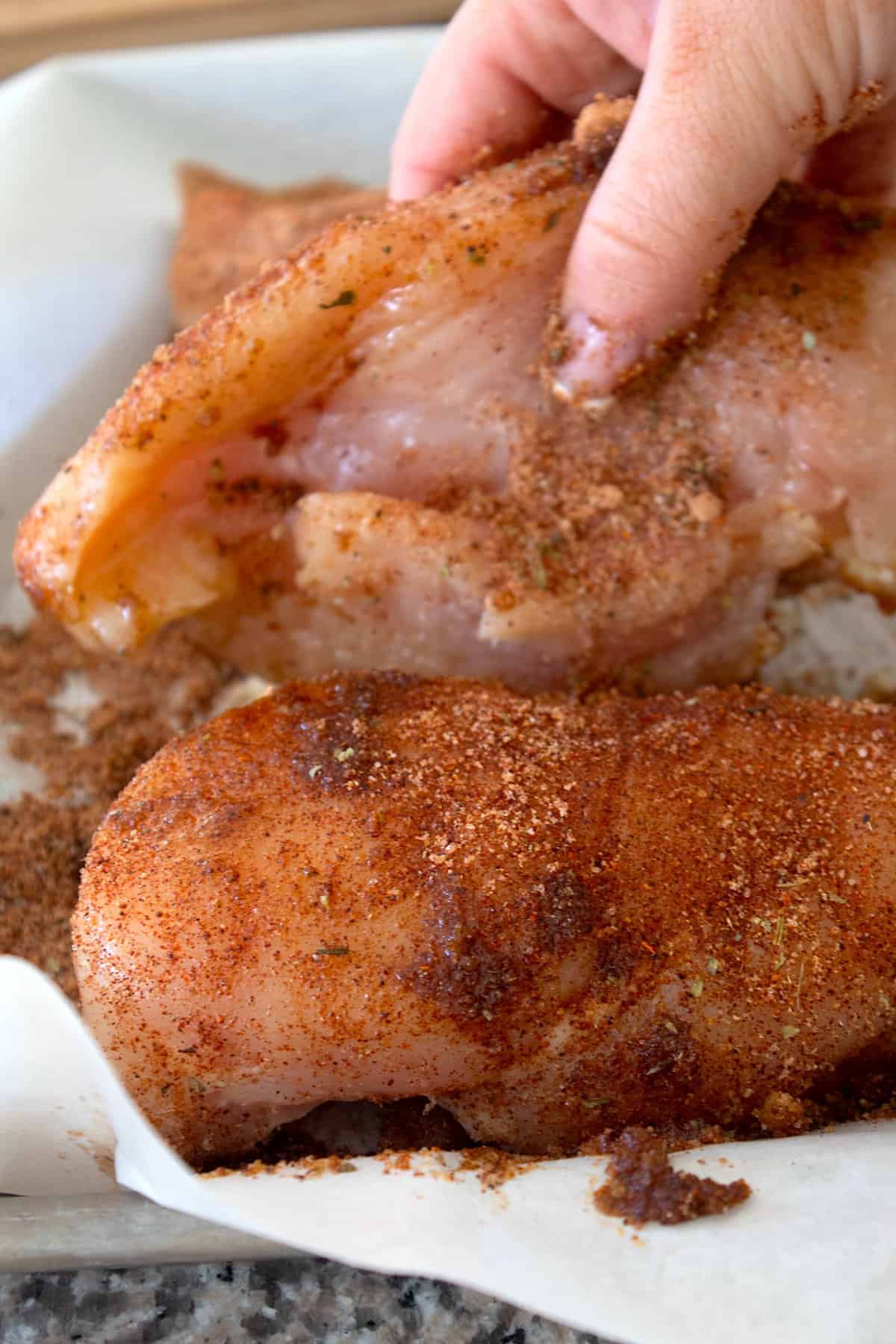 coating chicken in blackening seasoning