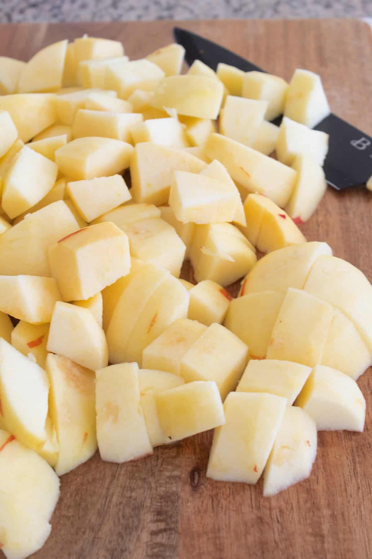 diced apples on a cutting board