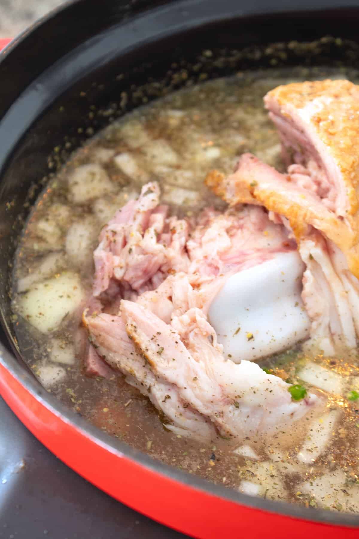 ham bone in slow cooker making split pea soup