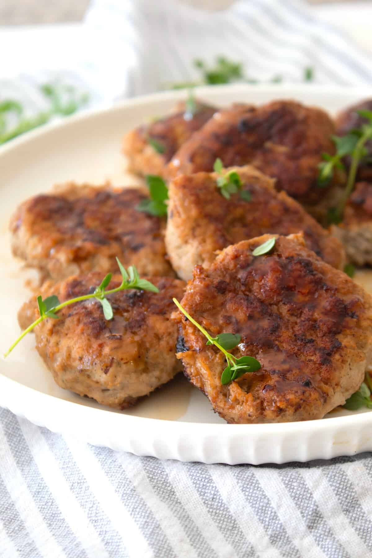 close up of turkey breakfast sausage on a white plate