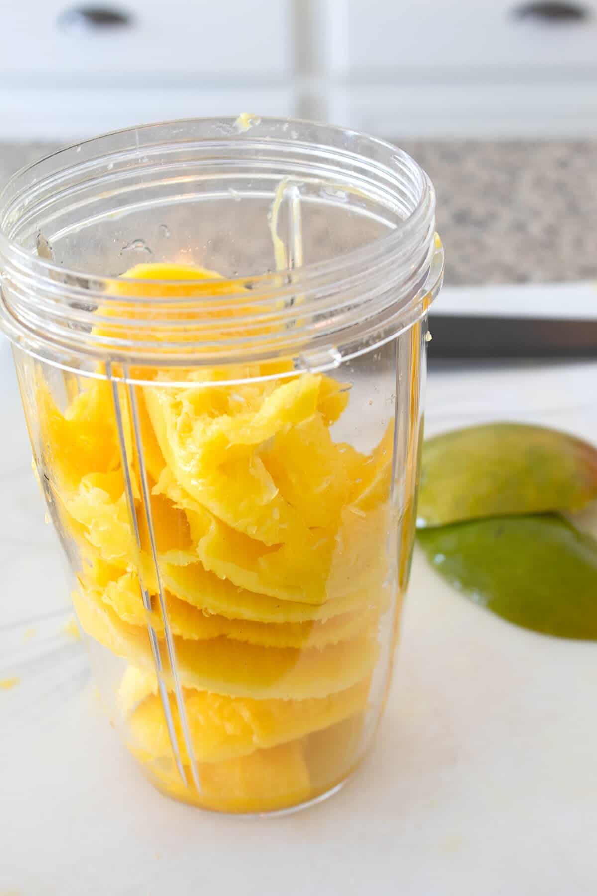blending fresh mangos