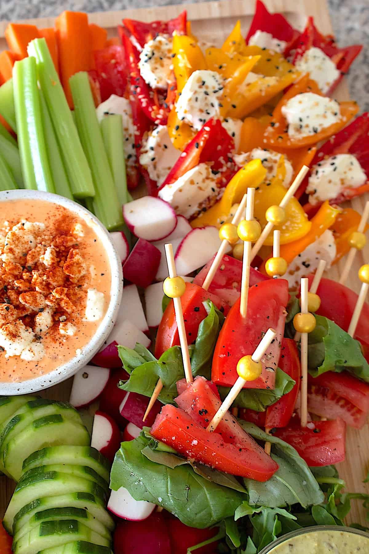 crudite board with roasted red pepper dip