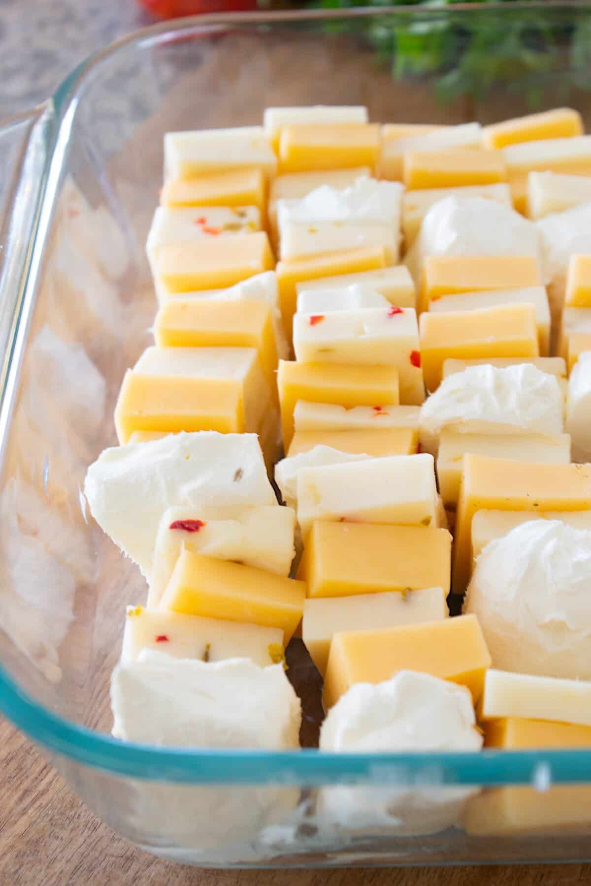 layered cheese in a glass dish
