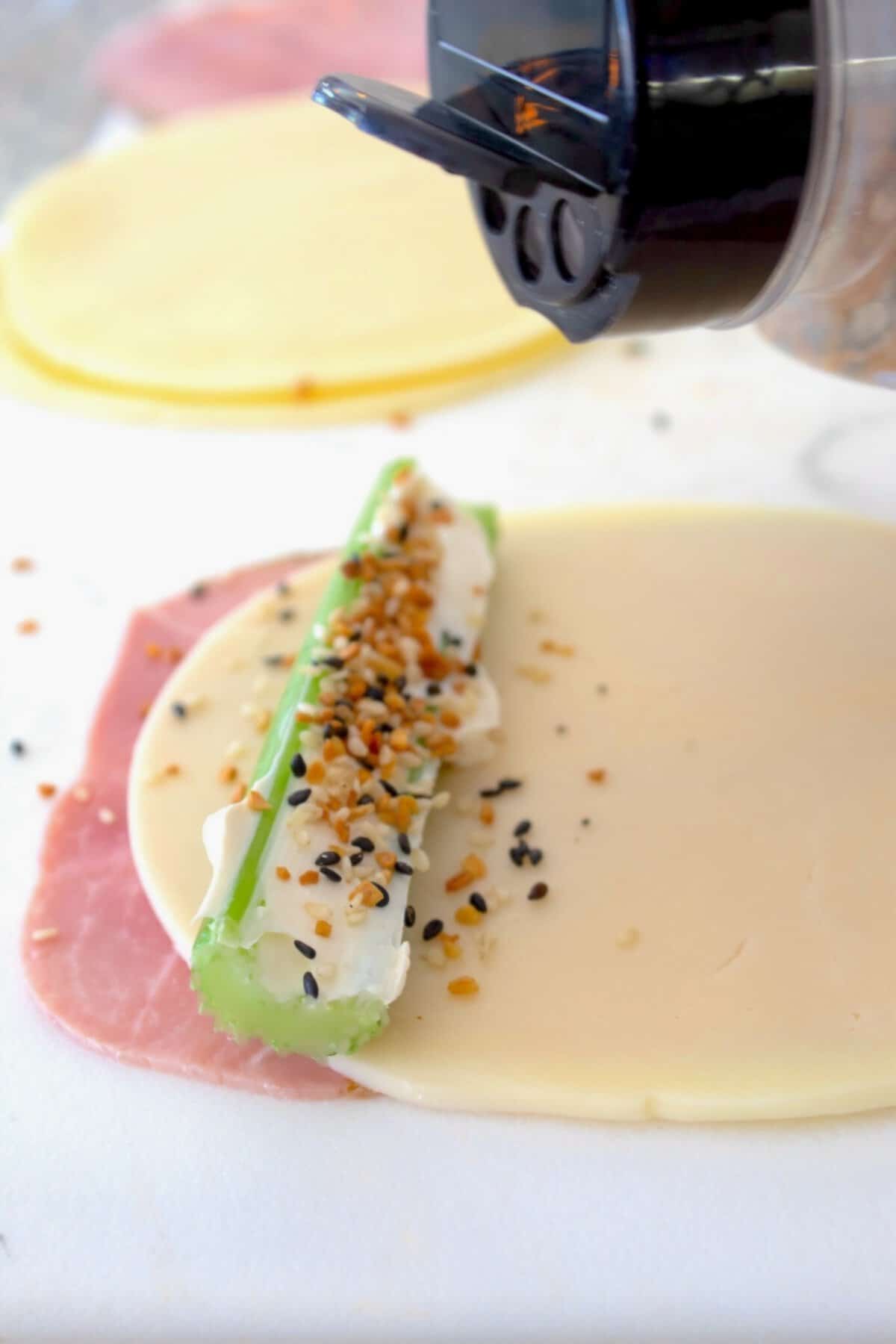 stuffed cream cheese celery with bagel seasoning on cheese and ham