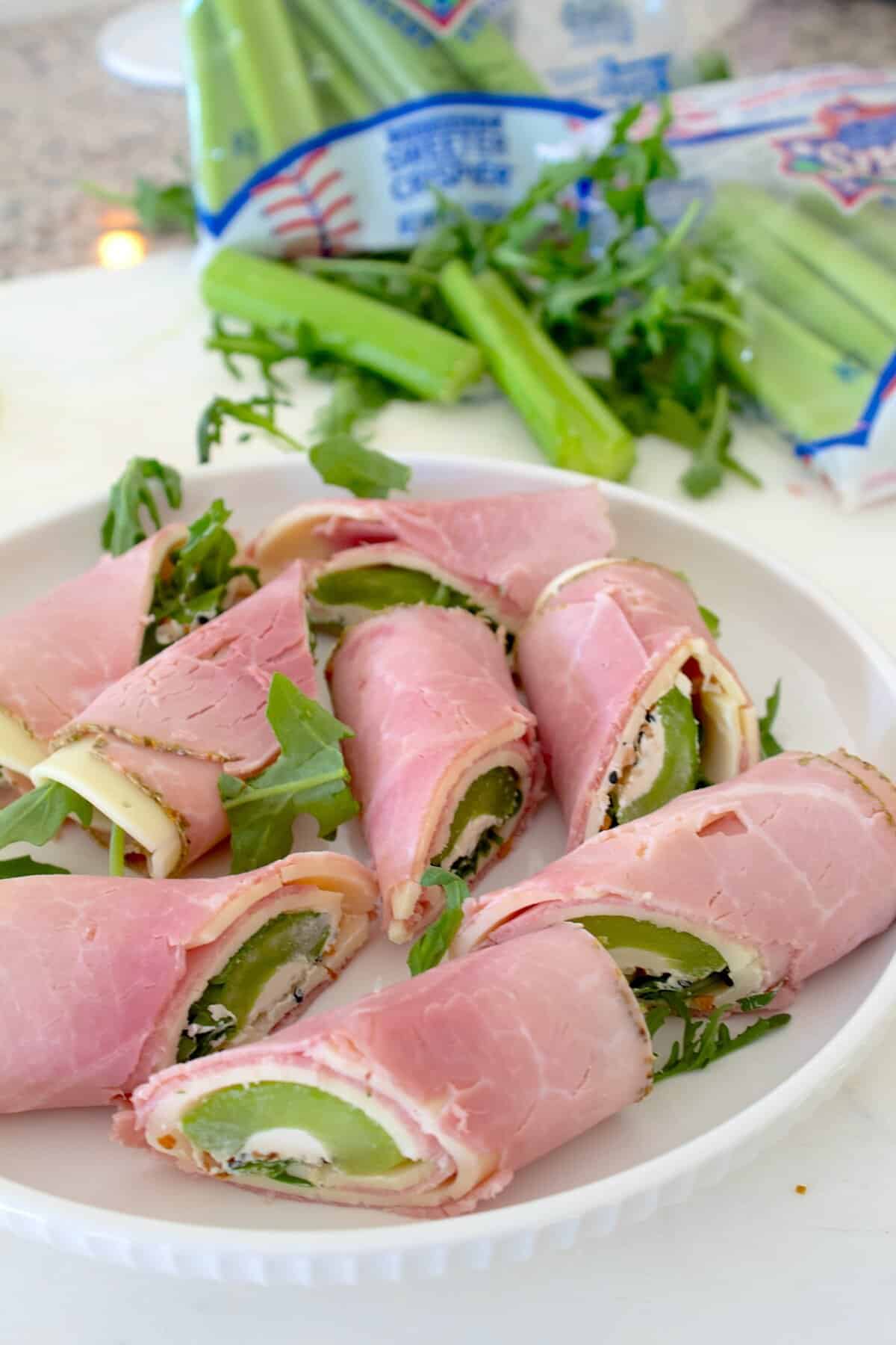 celery protein snacks on a white plate