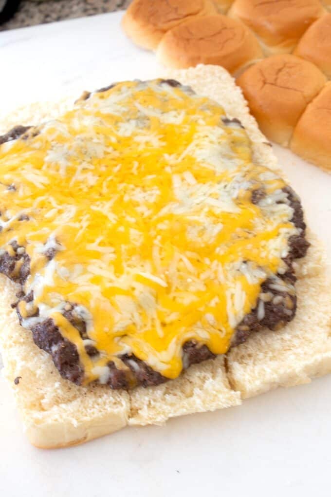 melted cheese on meat patty