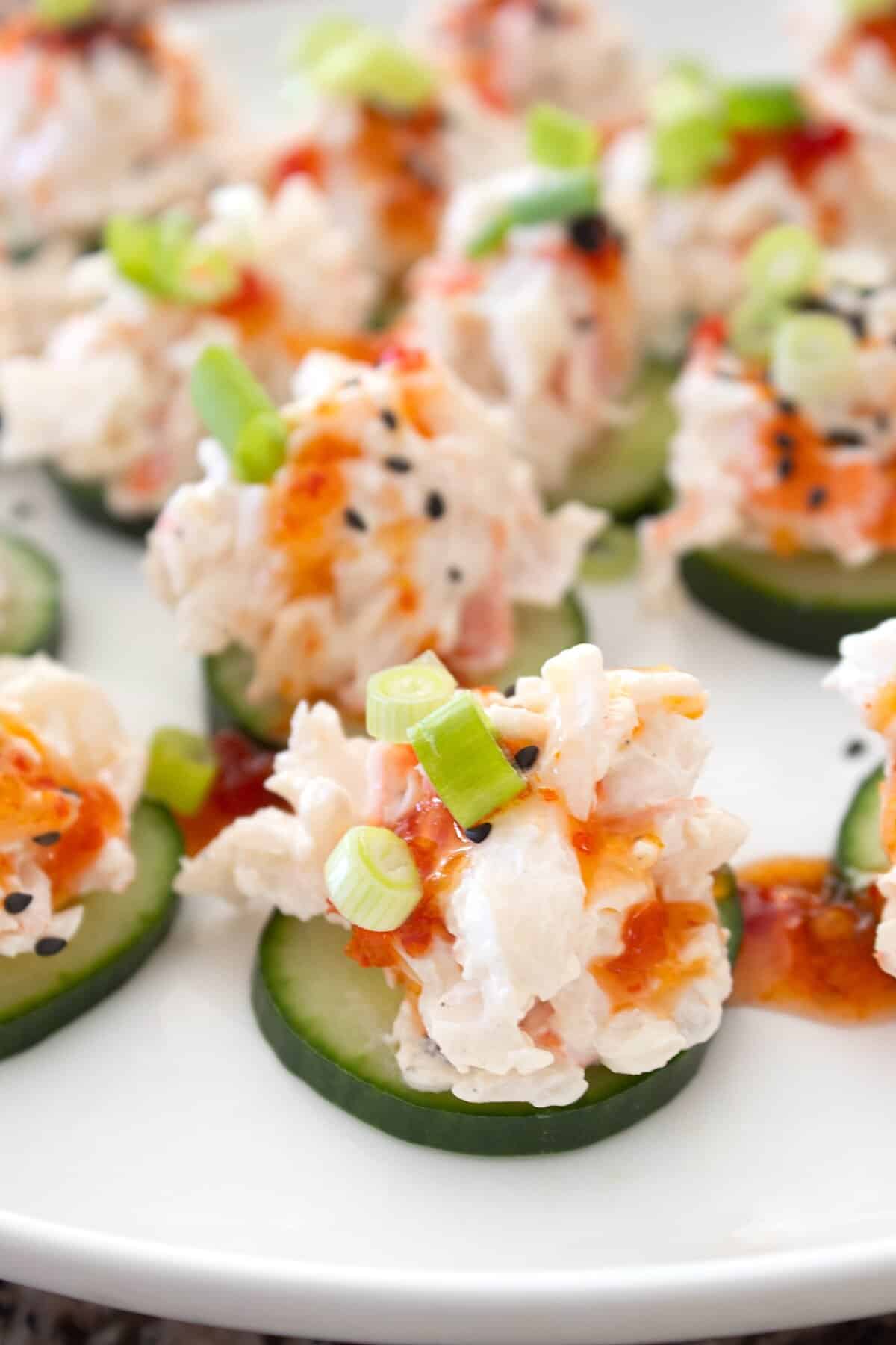 cucumber bite with crab salad on a plate