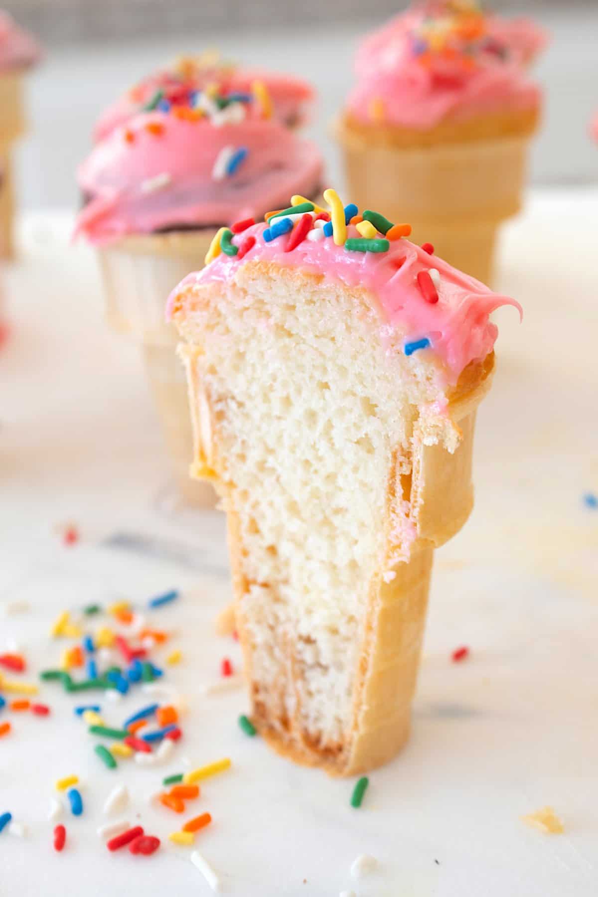 ice cream cone with cake inside cut in half