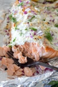 overhead view of greek yogurt baked salmon on a foil lined pan