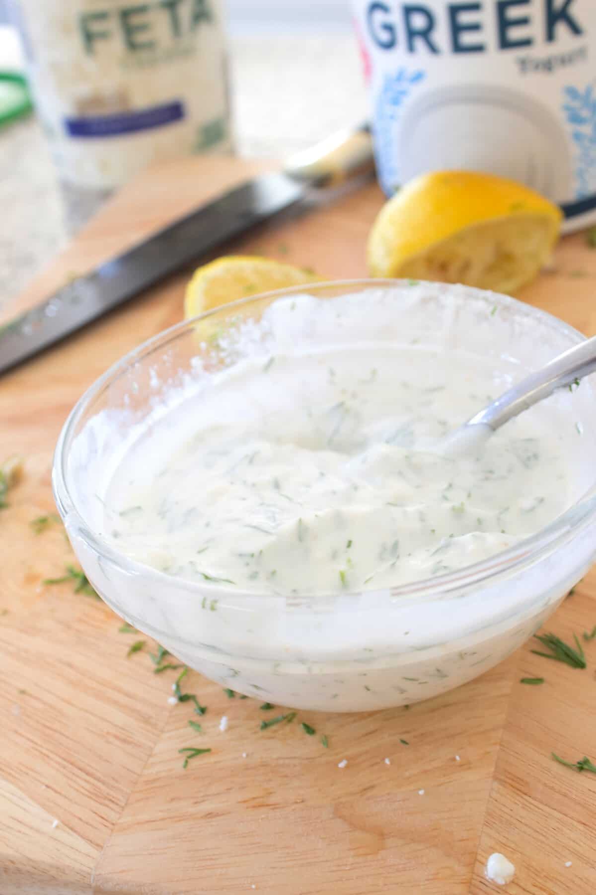 mixing up greek yogurt topping