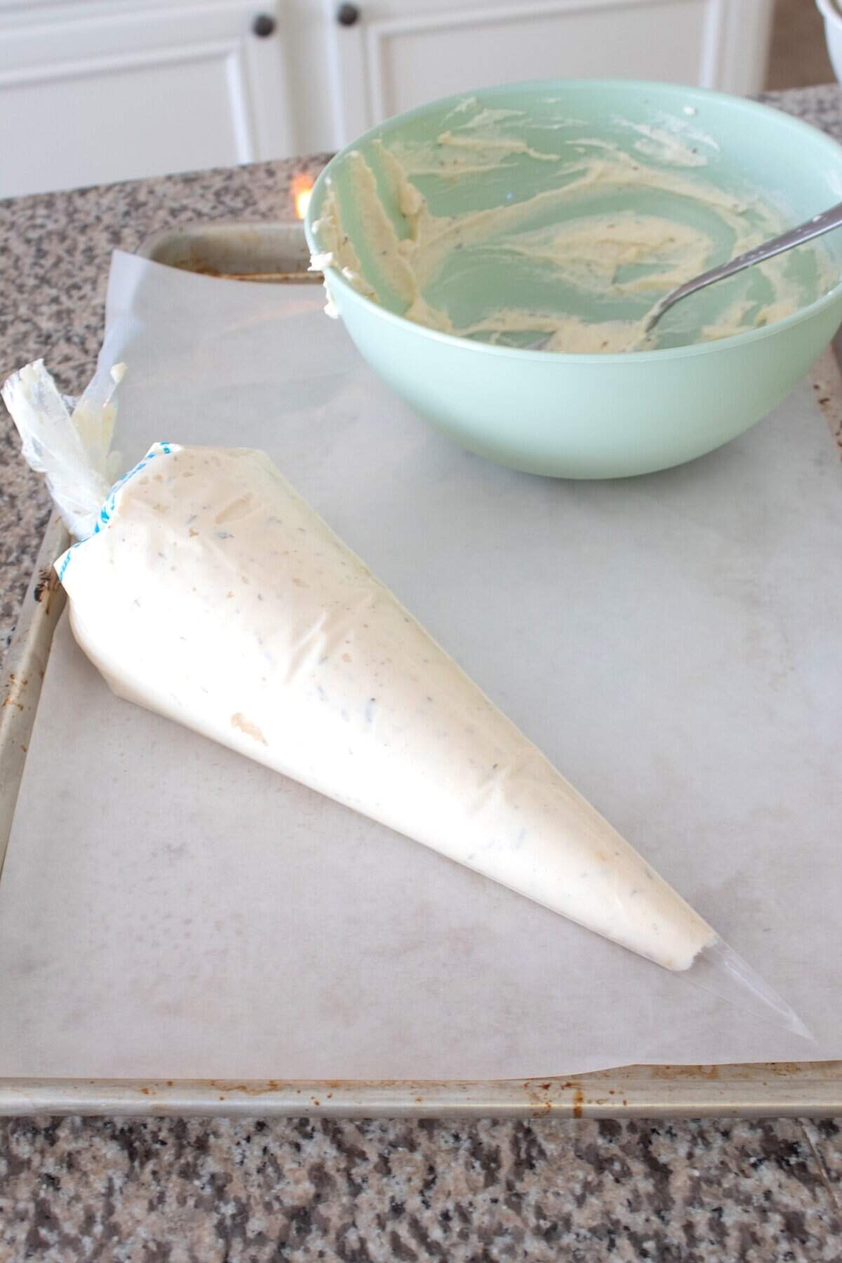 ricotta mixture in a piping bag
