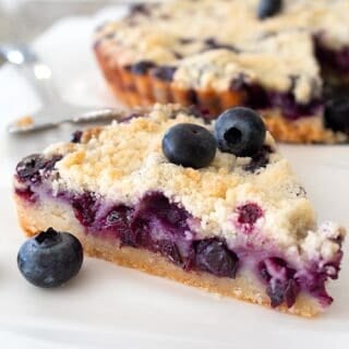 blueberry crumb bar on a cutting board