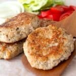 chicken burger patty on a spatula