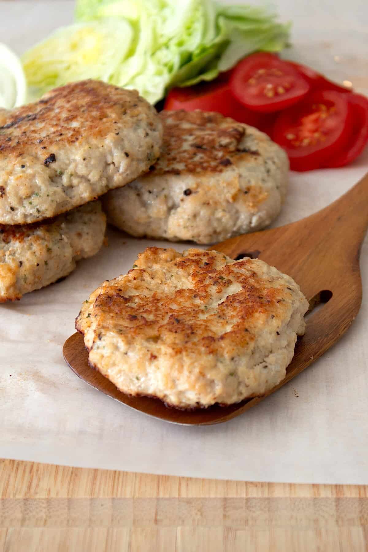 burger patty on a spatula