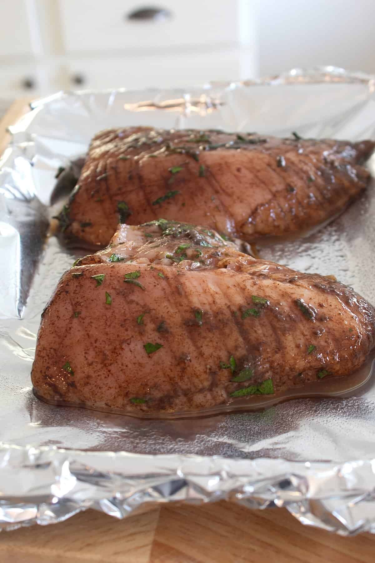 turkey tenderloin on sheet pan before baking
