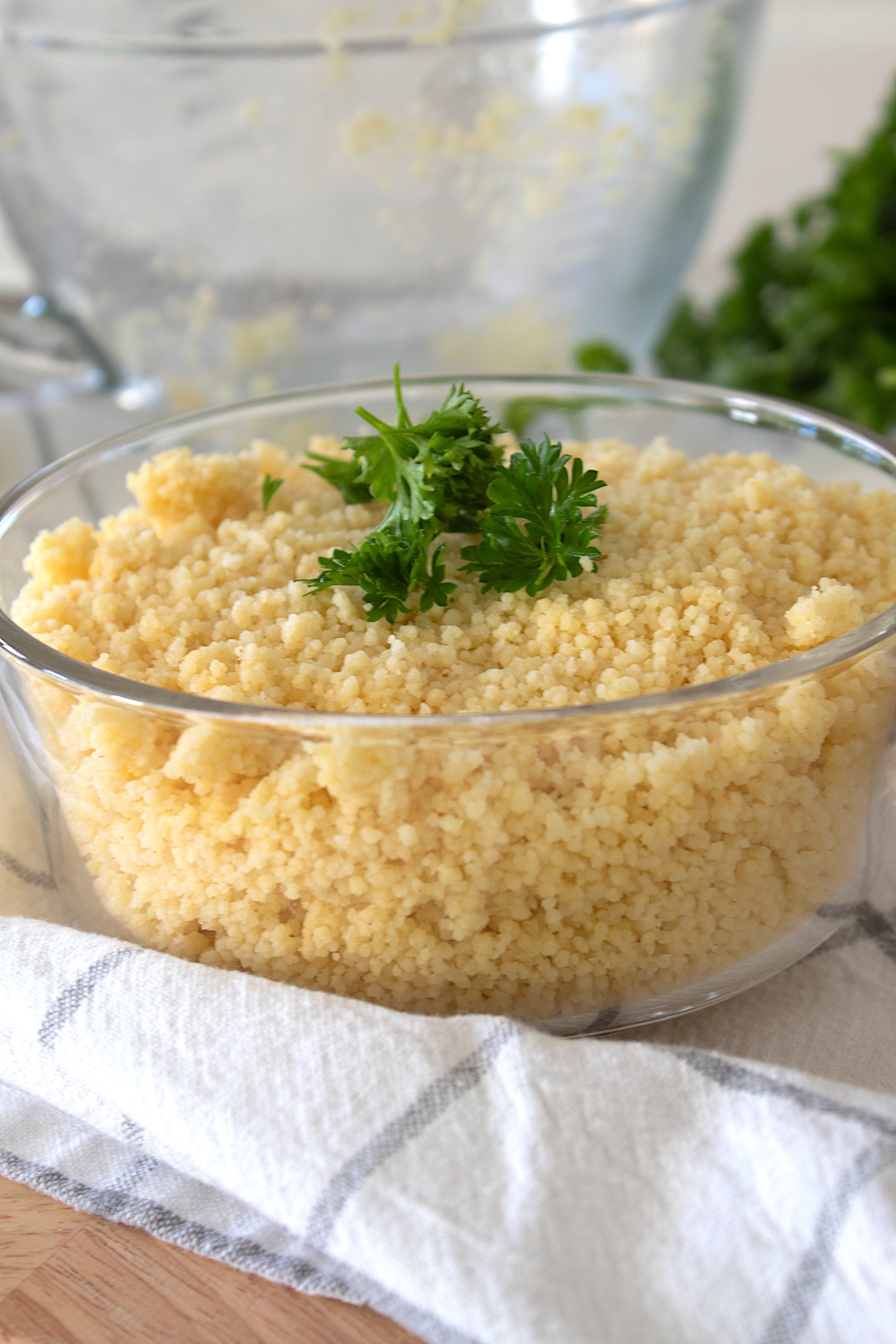 full view bowl of couscous on a tea towel