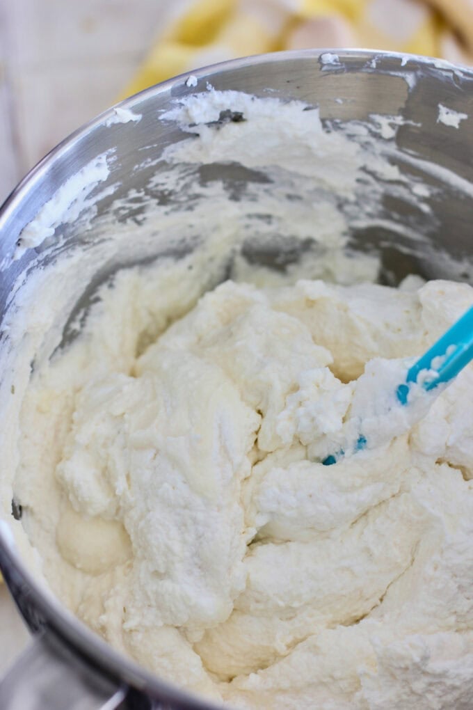 mixing mascarpone and heavy cream for filling