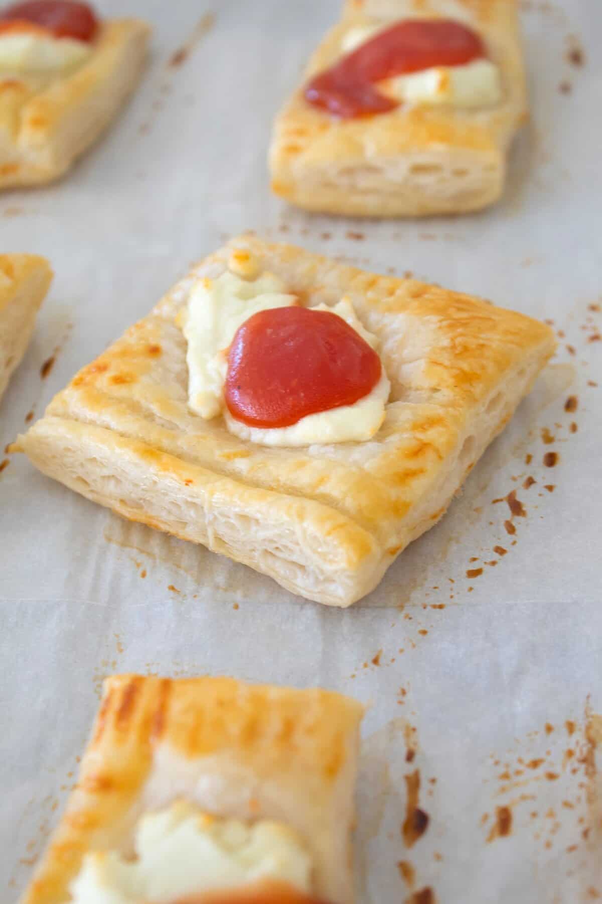 baked puff pastry tart with goat cheese and preserves