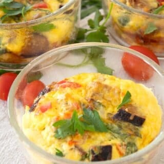 front shot of eggs baked in glass bowl