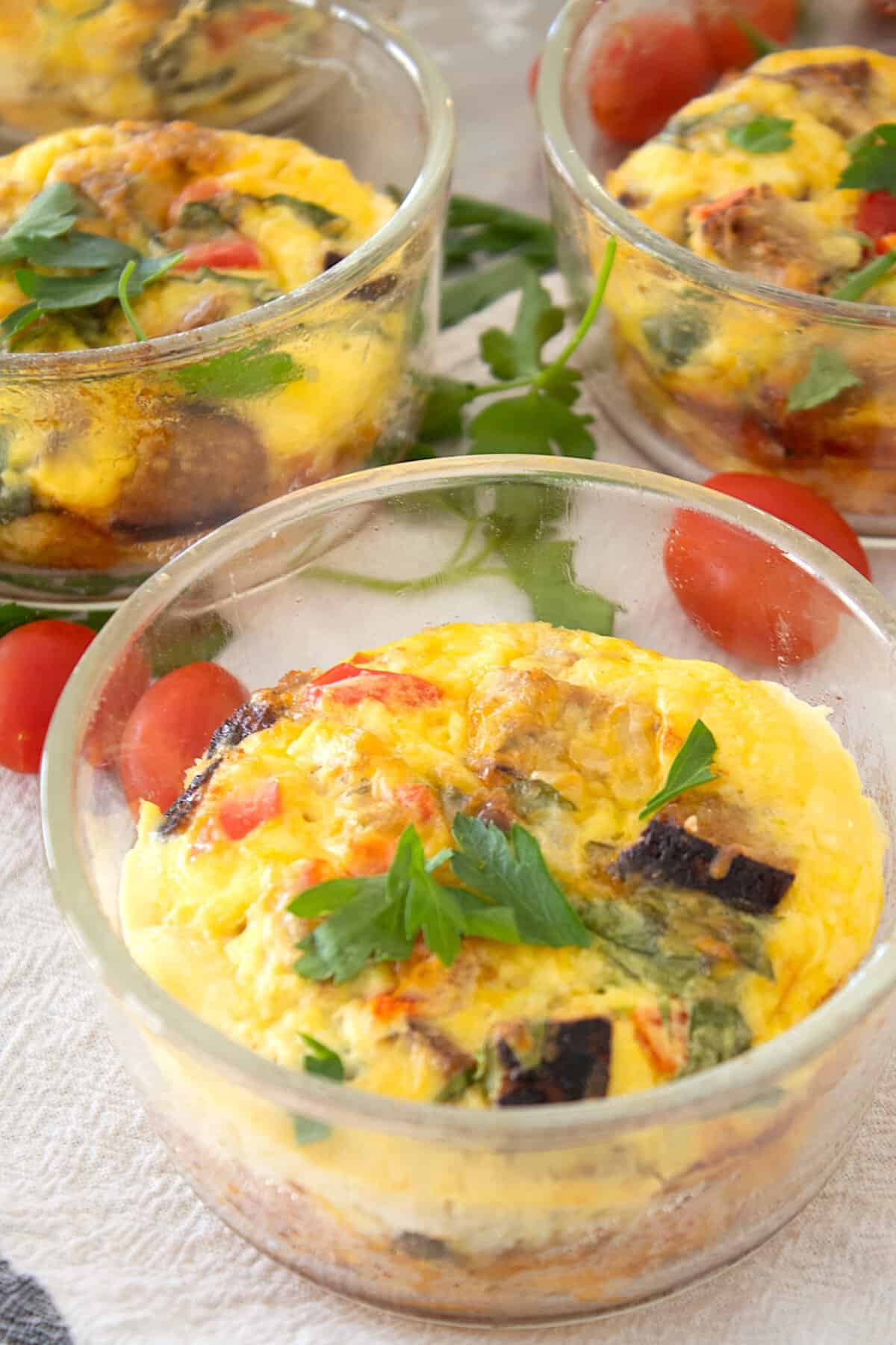 front shot of eggs baked in glass bowl