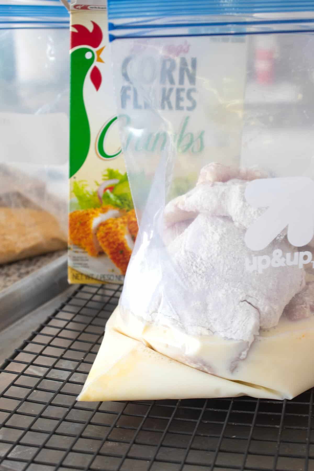 chicken thighs in a ziplock bag filled with egg wash 