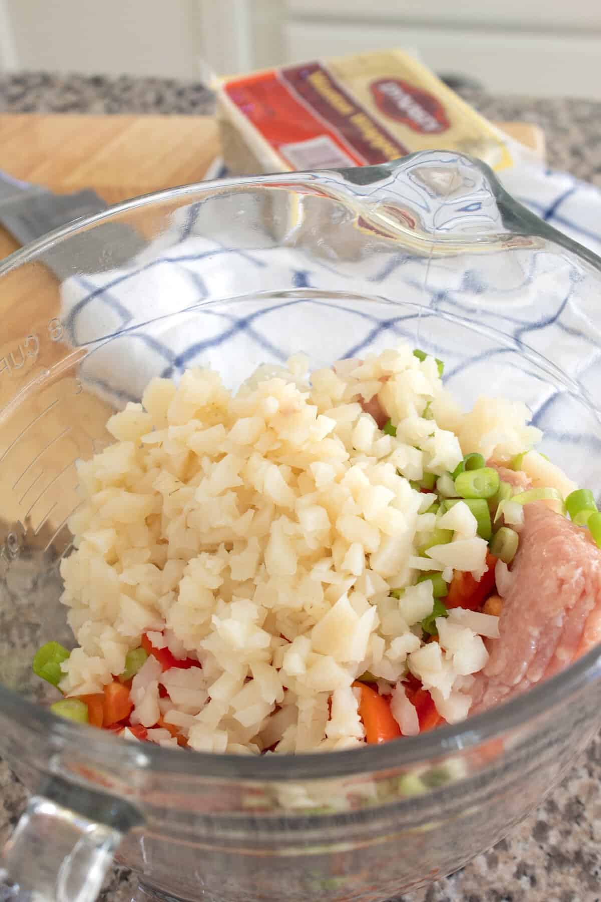 ground chicken mixture in a mixing bowl
