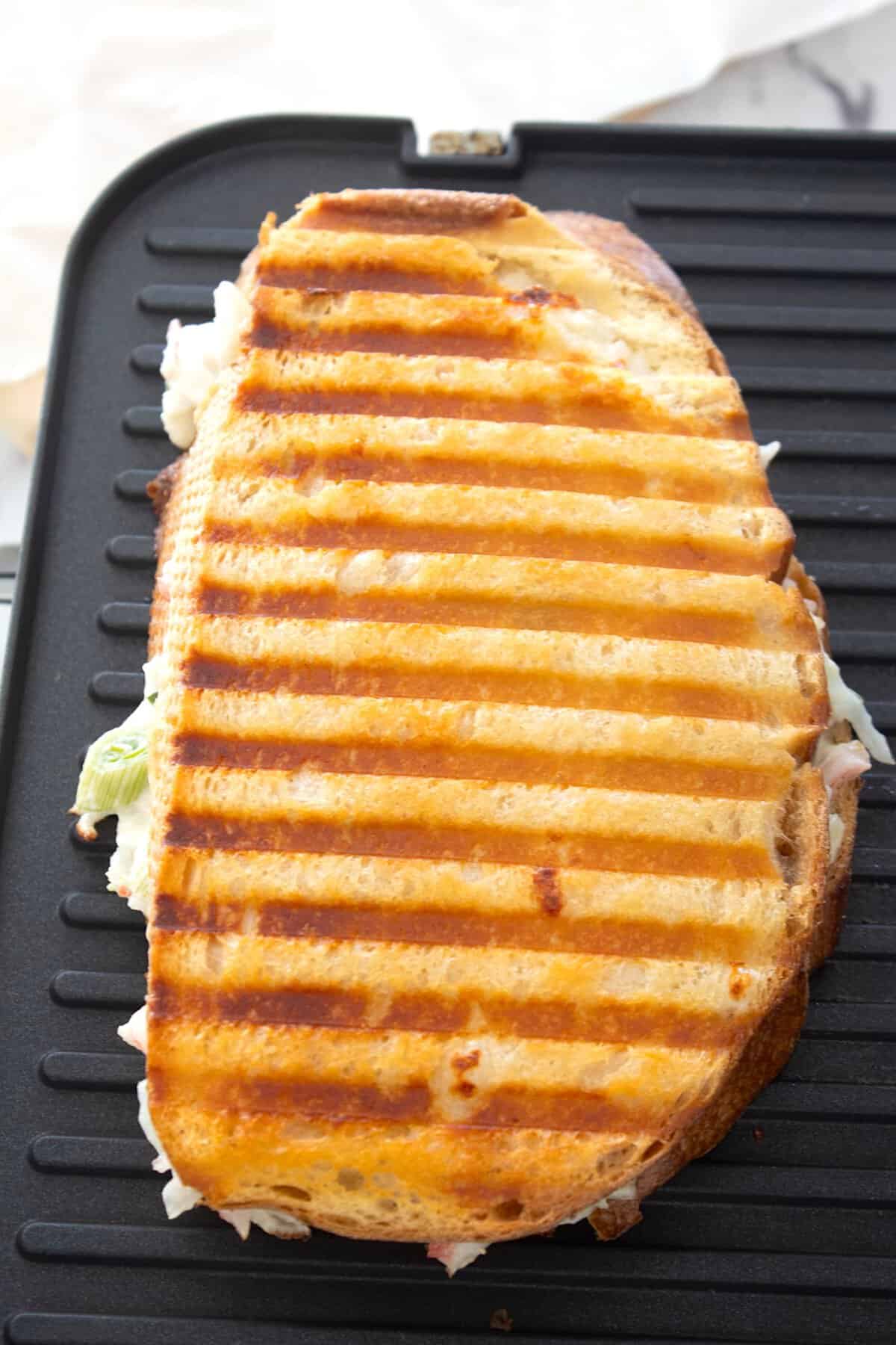 crab rangoon grilled cheese on a grill
